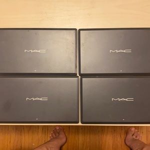 Four MAC 15-pan eyeshadow palettes
